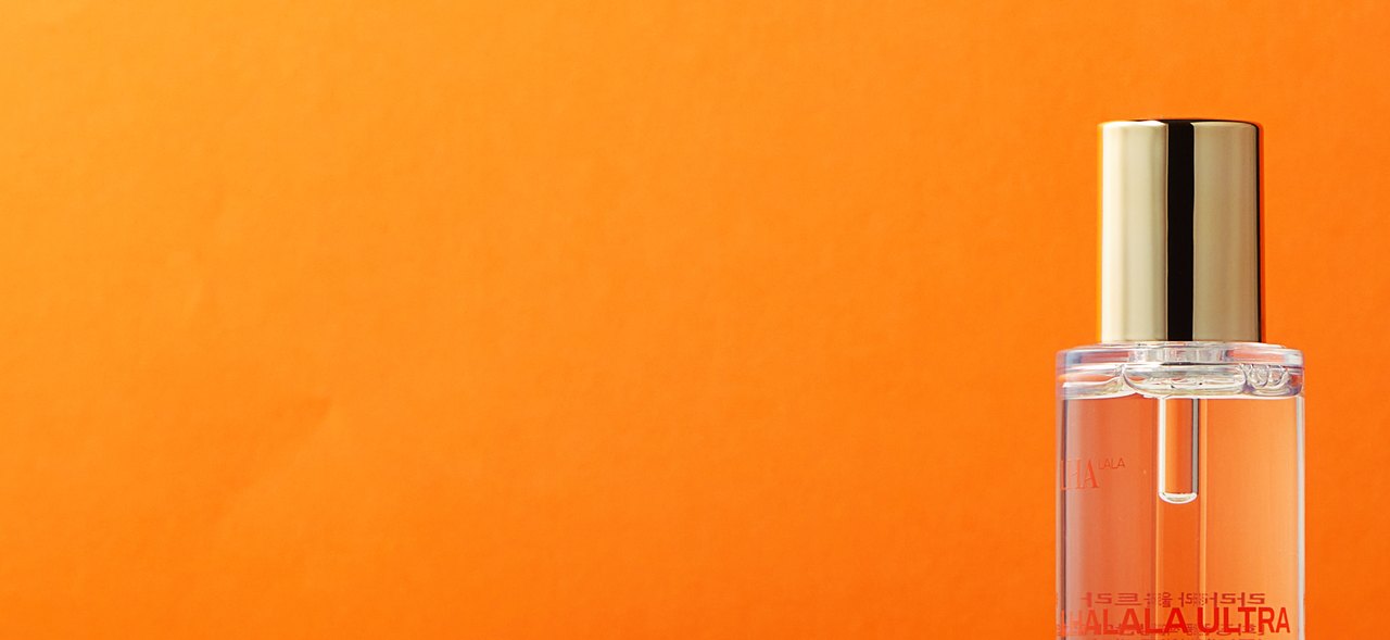 LHALA Peel (LHALALA Ultra) fourth-generation peeling solution bottle on an orange background